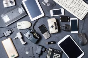 electronic devices lined up on table